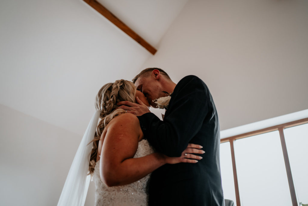 Villiers Barn Wedding First kiss